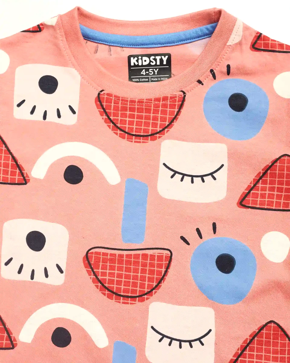 Abstract Faces Unisex Shorts Set fabric and fit close-up | A Tiny Bee