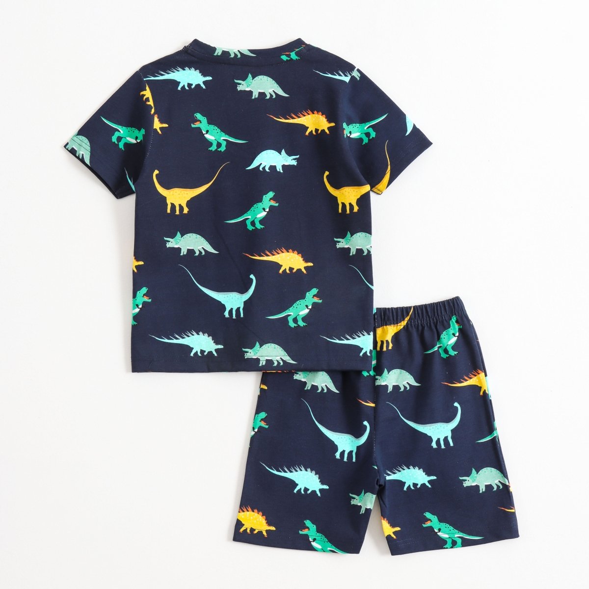 Dino Glow Shorts Set unisex kids shorts set — back flatlay | A Tiny Bee