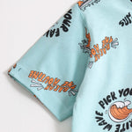 Dino Stamp Shorts Set sleeve, fabric and print detail | A Tiny Bee