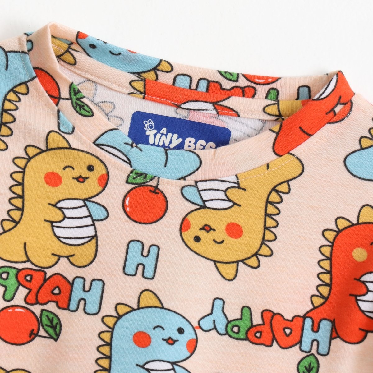 Doodle Dino Shorts Set sleeve, fabric and print detail | A Tiny Bee